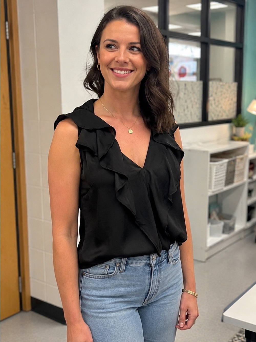 Black Ruffle Front Sleeveless Blouse